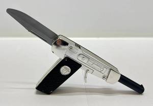 lot 219 image: 1965 Mattel Agent Zero M Pocket Shot Cap GunPocket Knife (Works)