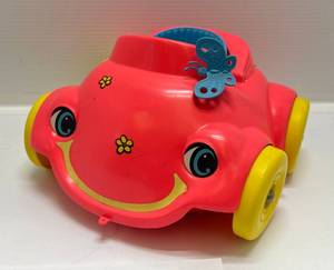 lot 289 image: 1969 Battery Operated  Baby Go Bye Bye Bumpety Car VW Bug Pink With Flowers (Works)