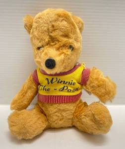 lot 293 image: 1960s Gund MFG. Winnie The Pooh Musical Plush Toy