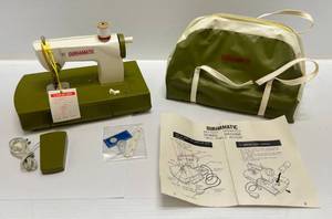 lot 294 image: 1960s DURHAMATIC Battery Operated Kids Sewing Machine In Original Carry Bag (Never Used With Tags)