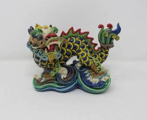 lot 16 image: Captivating Asian Ceramic Dragon and wooden stand