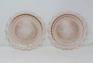 lot 31 image: Pair of Pink Depression Glass Plates and pink depression glass salt & pepper shakers