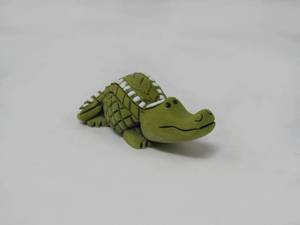 lot 76 image: Alligator Mom and baby  Artesaria Rinconada  Signed Silver Anniversary series  Uruguayan Artist