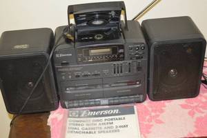 lot 8 image: Emerson CD Player Portable Stereo with AMFM, Dual Cassette and 2-Way Detachable Speakers