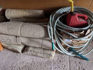 lot 112 image: Carpet Cuts, outdoor Pillow, Gas Can, Hose