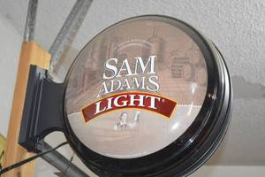 lot 30 image: Sam Adams light barber shop sign