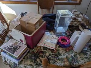 lot 93 image: Contents of Dining Room Table - Everything You See in the Picture DOES NOT INCLUDE TABLE