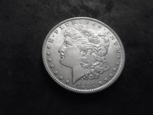lot 10 image: 1884 Morgan Silver Dollar
