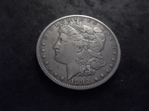 lot 22 image: 1892 O Morgan Silver Dollar