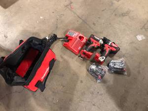 Milwaukee M18 18V Lithium-Ion Brushless Cordless Compact DrillImpact Combo Kit (2-Tool) W (2) 2.0Ah Batteries, Charger & Bag  Customer Returns See Pictures