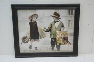 lot 36 image: Picture Of Boy and Girl Walking