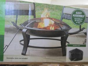 lot 94 image: Mainstays 28 inch Round Wood Burnin...