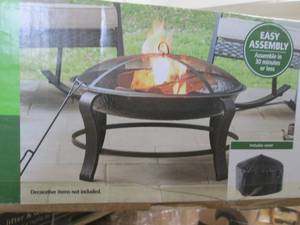lot 95 image: Mainstays 28 inch Round Wood Burnin...