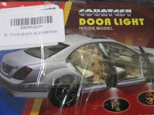 lot 170 image: 2- 4pc Courtesy Door Lights...