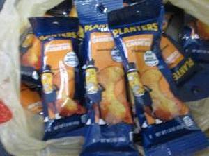 lot 424 image: 12- 2 oz pks Planters Roasted Cashe...