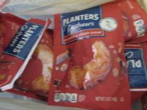 lot 461 image: 6- 5 oz Pks Planters Cinnamon & Bro...