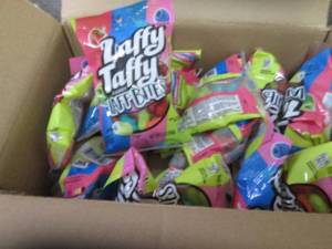 lot 496 image: 12- 3 oz Bags Laffy Taffy Laff Bite...