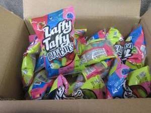 lot 497 image: 12- 3 oz Bags Laffy Taffy Laff Bite...