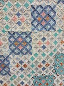 lot 2 image: Intricate Cathedral Window Patchwork Hand-Quilted Blanket