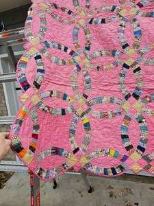 lot 64 image: PinkPatchwork Double Ring Hand-quilted Blanket