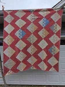 lot 74 image: Country Chic Mirrored Block Pattern Quilt