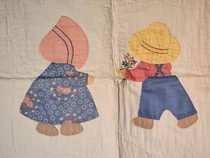 lot 77 image: Adorable Vintage Handmade Nursery Quilt - Boy & Girl in Bonnet