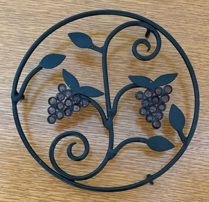 Four Decorative Trivets