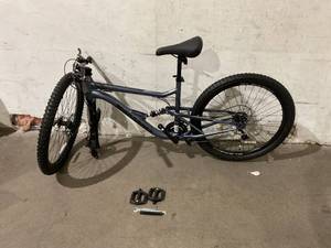 lot 303 image: Mongoose 26 Inch Slate Blue Status 21-Speed Youth and Adult Mountain Bike