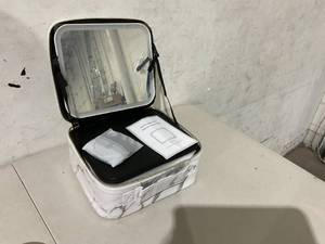 lot 347 image: Jadazror White Marble Print Makeup Bag with Mirror and LED Light