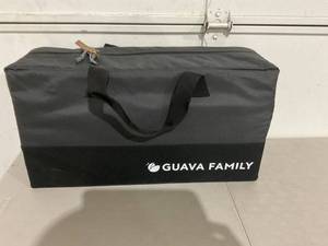 lot 77 image: Guava Family Gray Lotus Travel CribPlaypen