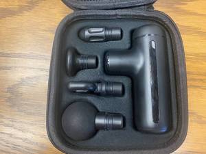 lot 15 image: Massage Gun & Accessories