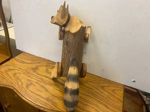 lot 17 image: Wooden Raccoon Carving