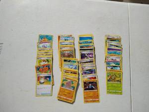 lot 54 image: (100) Pokemon Cards