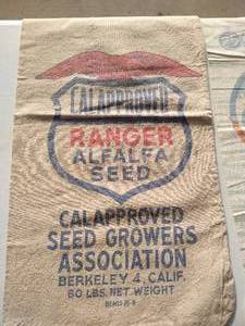 lot 66 image: (2) Vintage Feed & Seed Sacks