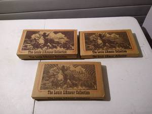 lot 97 image: (3) The Louis LAmour Collection Books - New In Original Mailing Box