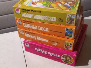 lot 149 image: (4) Vintage Disney & Woody Woodpecker Puzzles