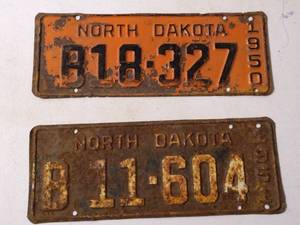 lot 155 image: (2) Antique North Dakota Plates