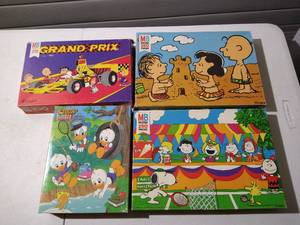 lot 210 image: (4) Vintage Kids Puzzles - Peanuts & Disney