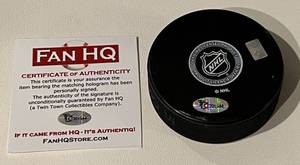lot 310 image: Mario Lucia Signed Hockey Puck with Fan HQ COA, Minnesota WIld