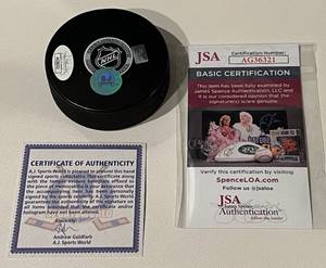 lot 312 image: Dave Andreychuk Signed Hockey Puck with JSA COS, Toronto Maple Leafs