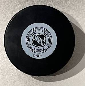 lot 316 image: Tom Reid Signed Minnesota Wild Hockey Puck