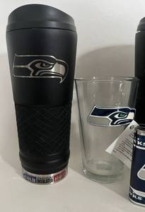 lot 323 image: Seattle Seahawks Fan Pack - 2 24 ox Coffee Mugs, Flask, and Beer Glass NFL Licensed Products Football