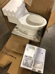 Toilet by Glacier Bay  Customer Returns See Pictures