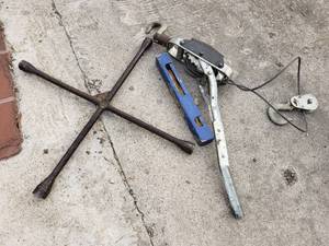 lot 75 image: 4 Square Tire Iron, Come a Long, Trailer Lock