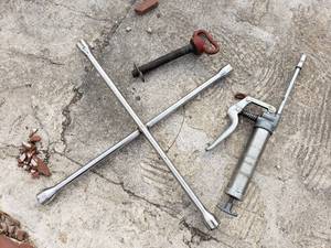 lot 76 image: 4 Square Tire Iron, Grease Gun, Hitch Pin