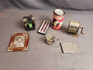 lot 138 image: Misc. Vintage Pens, Clothesline, Shirley Temple Picture, Pencil Sharpener, Cigarette Case