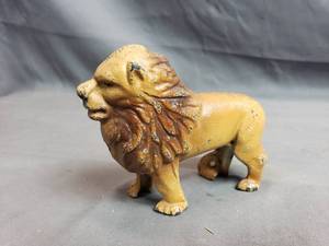 lot 140 image: 2 Piece Cast Iron Lion Coin Bank Piggy Bank