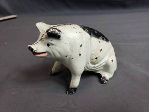 lot 142 image: 2 Piece Cast Iron Pig Coin Bank Piggy Bank