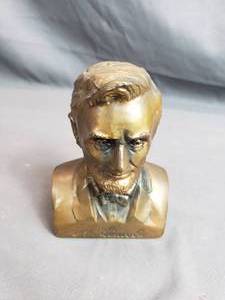 lot 144 image: 1974 Abraham Lincoln Banthrico Piggy Bank