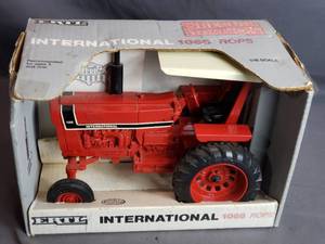 lot 200 image: Ertl International 1066 ROPS Special Edition 116 Scale Tractor